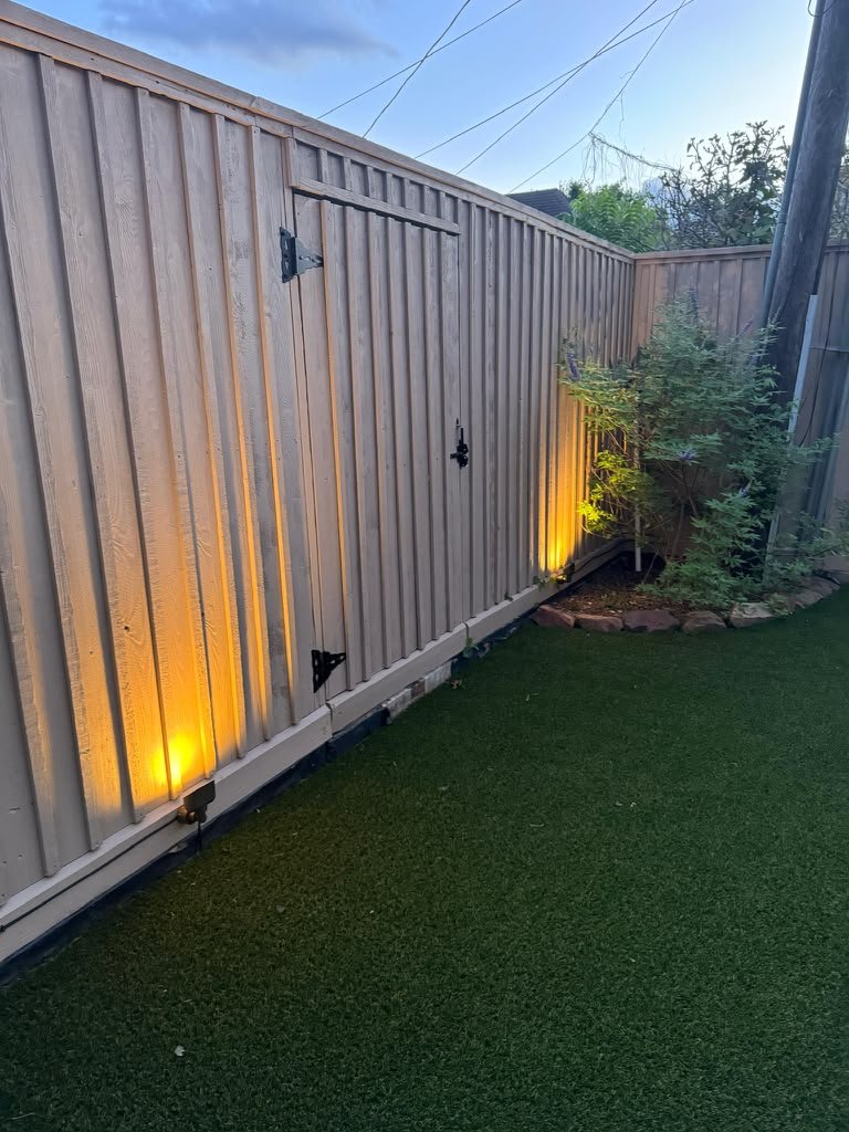 Landscape lighting illuminating a residential outdoor area